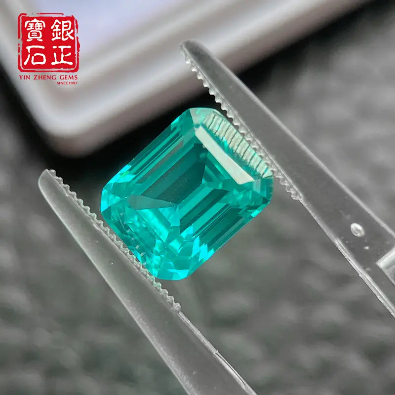 Flame Melted Paraiba Emerald Cut