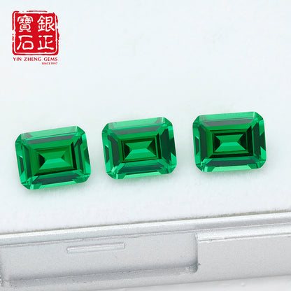 Flame Melted Lab Grown Tsavorite Emerald Cut