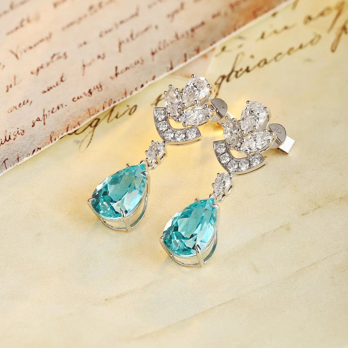 PT950 Cultured Diamond & Lab Grown Paraiba 11ct Pear Shape Earrings