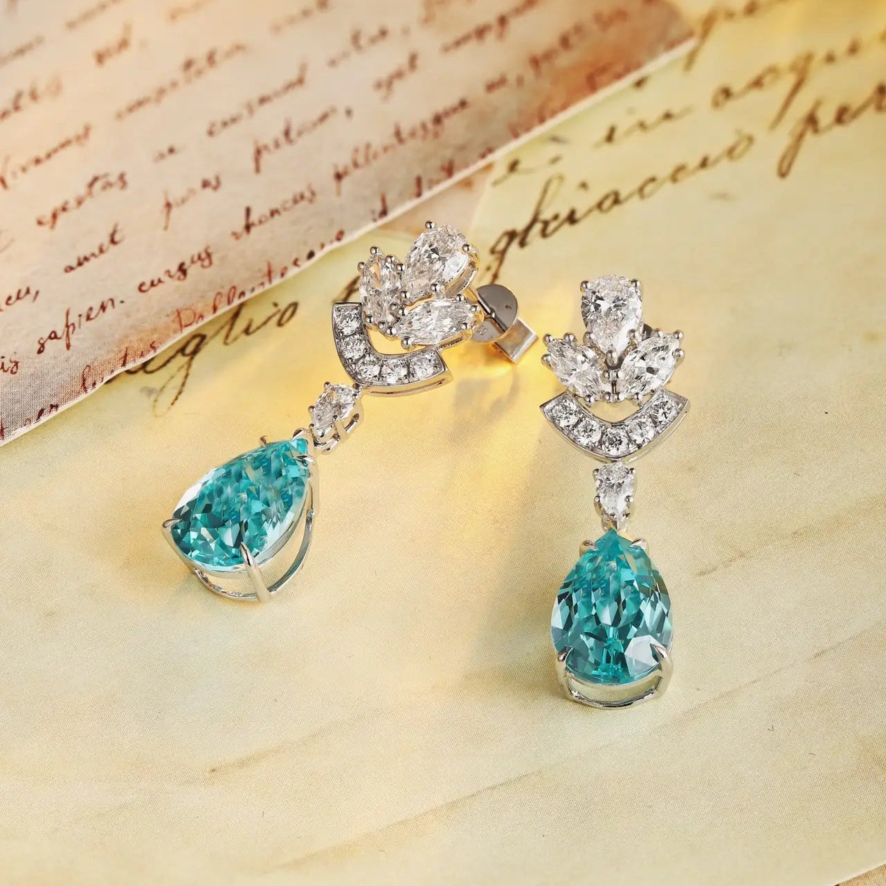 PT950 Cultured Diamond & Lab Grown Paraiba 11ct Pear Shape Earrings