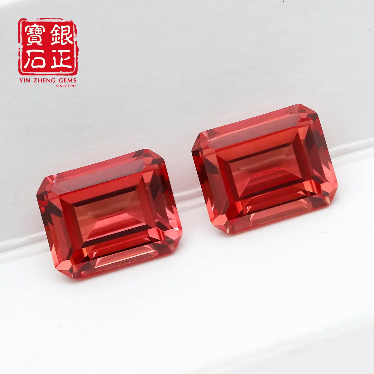 Flame Melted Lab Grown Paparacha Emerald Cut