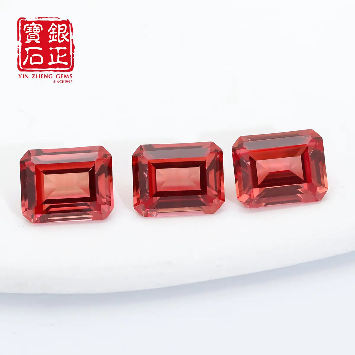 Flame Melted Lab Grown Paparacha Emerald Cut