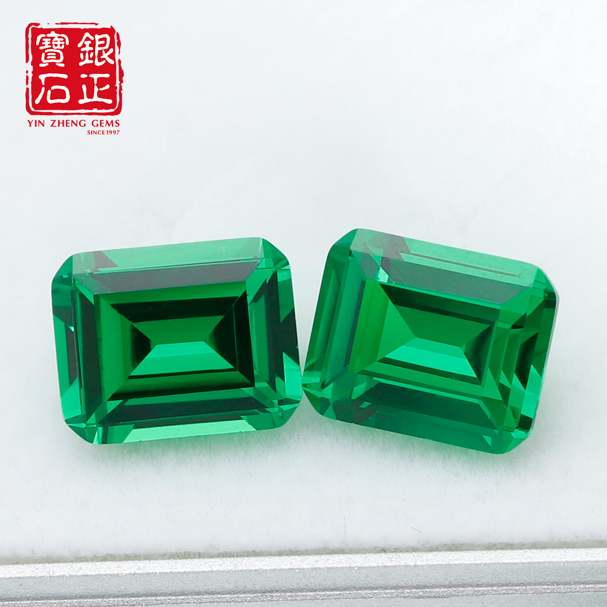 Flame Melted Lab Grown Tsavorite Emerald Cut