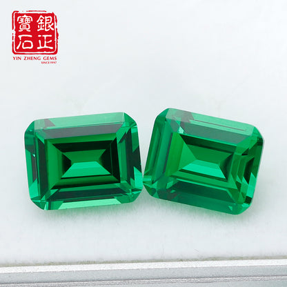Flame Melted Lab Grown Tsavorite Emerald Cut
