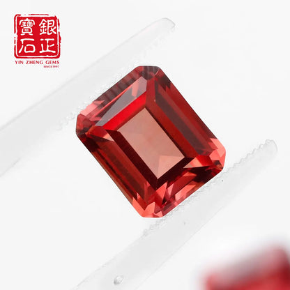 Flame Melted Lab Grown Paparacha Emerald Cut